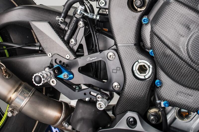 Pedane Regolabili Con Poggia Piedi Fissi per Suzuki Naturale